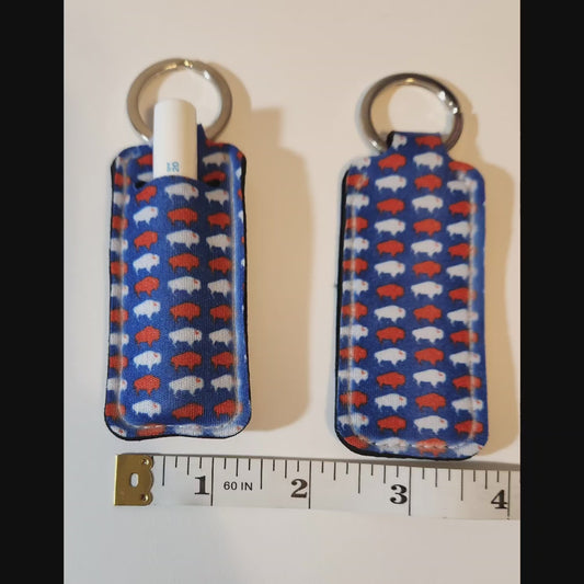 Blue lip balm holder with white and red Buffalos